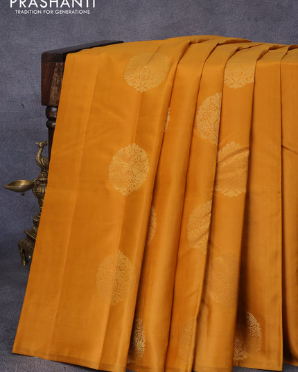 Pure kanjivaram silk saree mustard shade and dual shade of pinkish orange with zari woven buttas in borderless style