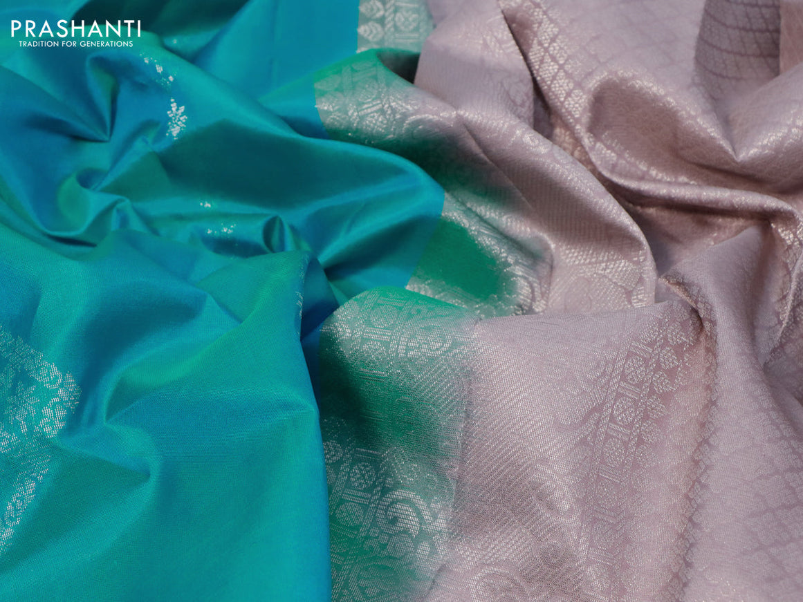 Pure kanjivaram silk saree teal blue and pastel brown with silver zari woven buttas in borderless style