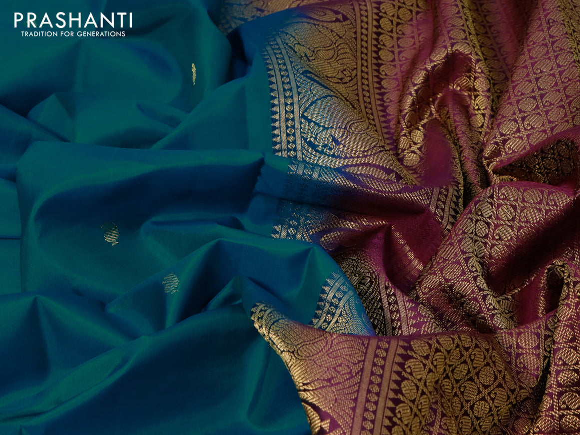 Pure kanjivaram silk saree teal blue and deep purple with zari woven buttas and annam zari woven korvai border