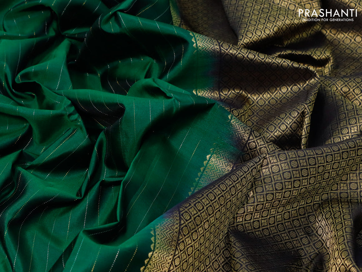 Pure kanjivaram silk saree green and black with allover zari stripes pattern and zari woven border