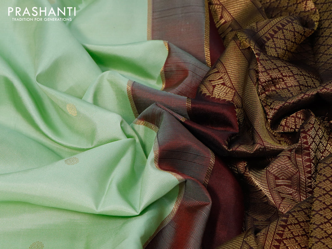Pure kanjivaram silk saree pastel green and deep maroon with zari woven buttas and zari woven korvai border