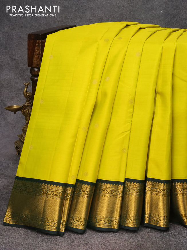 Pure kanjivaram silk saree lime yellow and dark green with zari woven buttas and zari woven korvai border