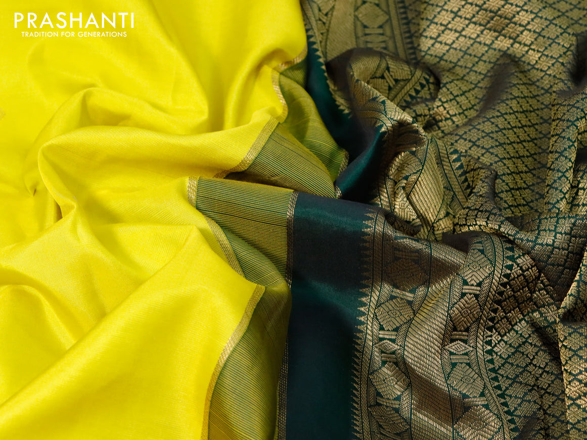 Pure kanjivaram silk saree lime yellow and dark green with zari woven buttas and zari woven korvai border