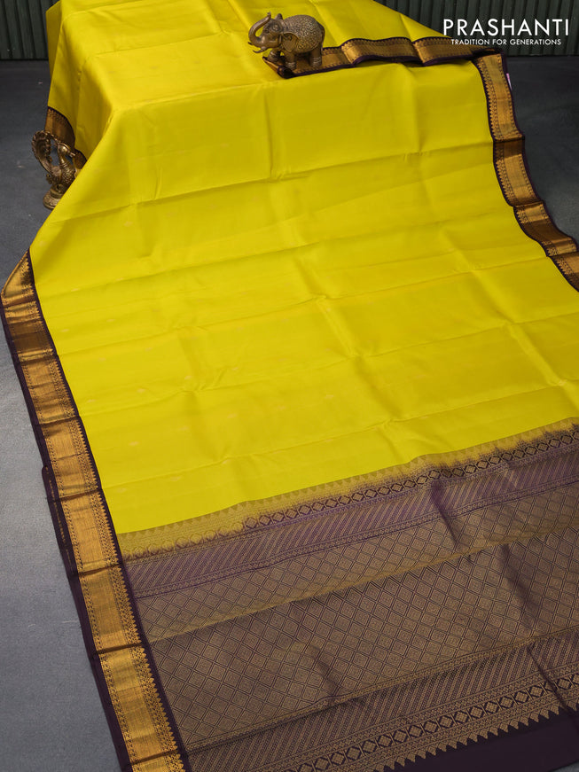 Pure kanjivaram silk saree lime yellow and deep wine shade with zari woven buttas and zari woven korvai border