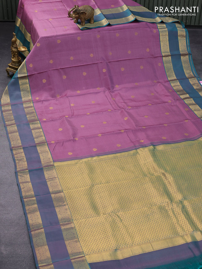 Pure kanjivaram silk saree mild purple and dual shade of teal green with zari woven buttas and rettapet zari woven border