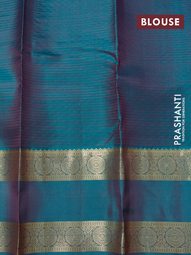 Pure kanjivaram silk saree mild purple and dual shade of teal green with zari woven buttas and rettapet zari woven border