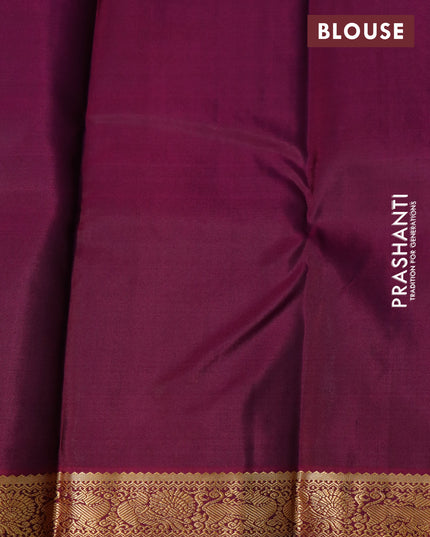 Pure kanjivaram silk saree teal blue and purple with allover self emboss & zari buttas ad zari woven korvai border