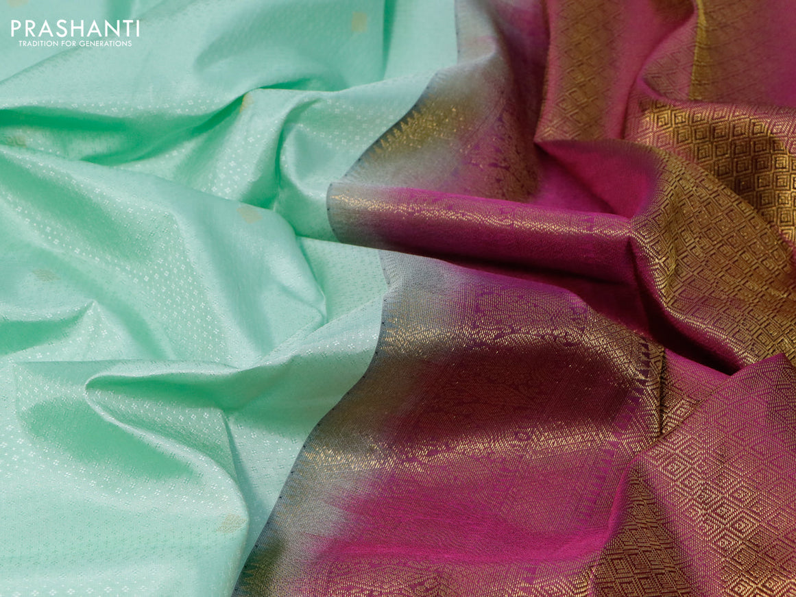 Pure kanjivaram silk saree pastel green and purple with allover self emboss & zari buttas ad zari woven korvai border