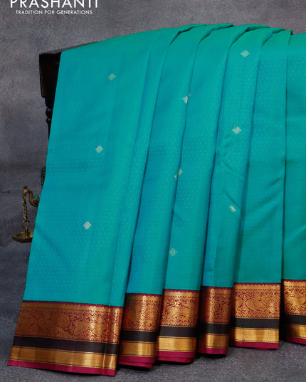 Pure kanjivaram silk saree teal blue and purple with allover self emboss ad zari woven korvai border