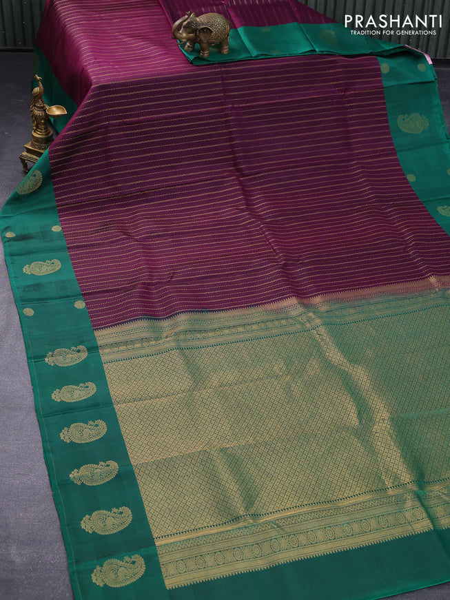 Pure kanjivaram silk saree deep purple and green with allover zari weaves and zari woven butta border