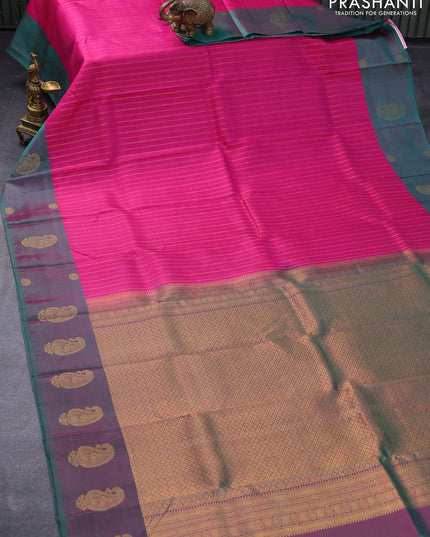 Pure kanjivaram silk saree pink and dual shade of teal green with allover zari weaves and zari woven butta border