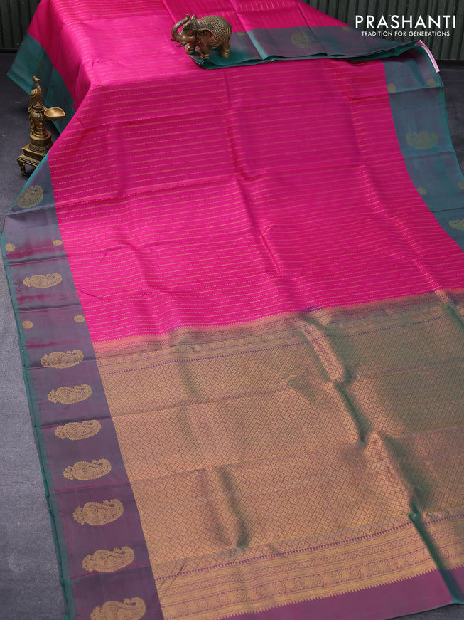 Pure kanjivaram silk saree pink and dual shade of teal green with allover zari weaves and zari woven butta border