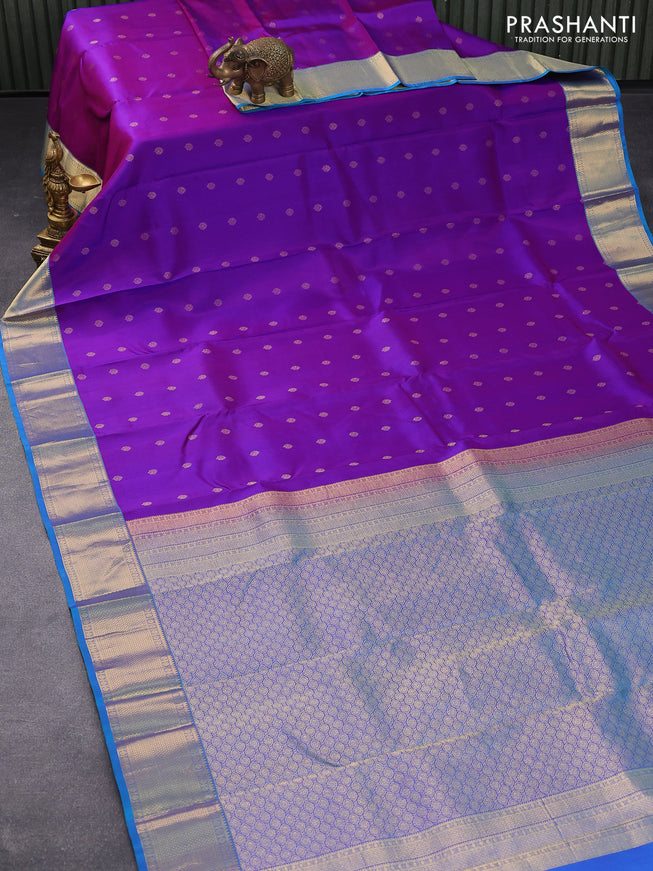 Pure kanjivaram silk saree dual shade of purple and cs blue with zari woven buttas and zari woven border