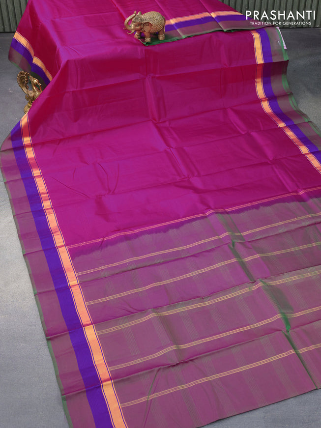 Pure kanjivaram silk saree pink and dual shade of greenish pink with plain body and zari woven simple border