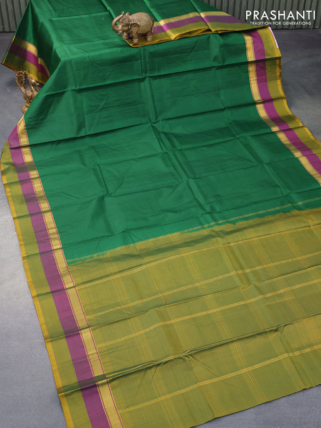 Pure kanjivaram silk saree green and mehendi green with plain body and zari woven simple border
