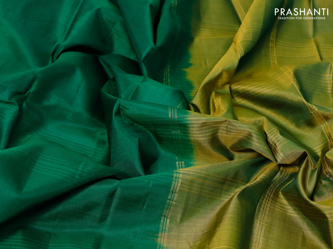 Pure kanjivaram silk saree green and mehendi green with plain body and zari woven simple border