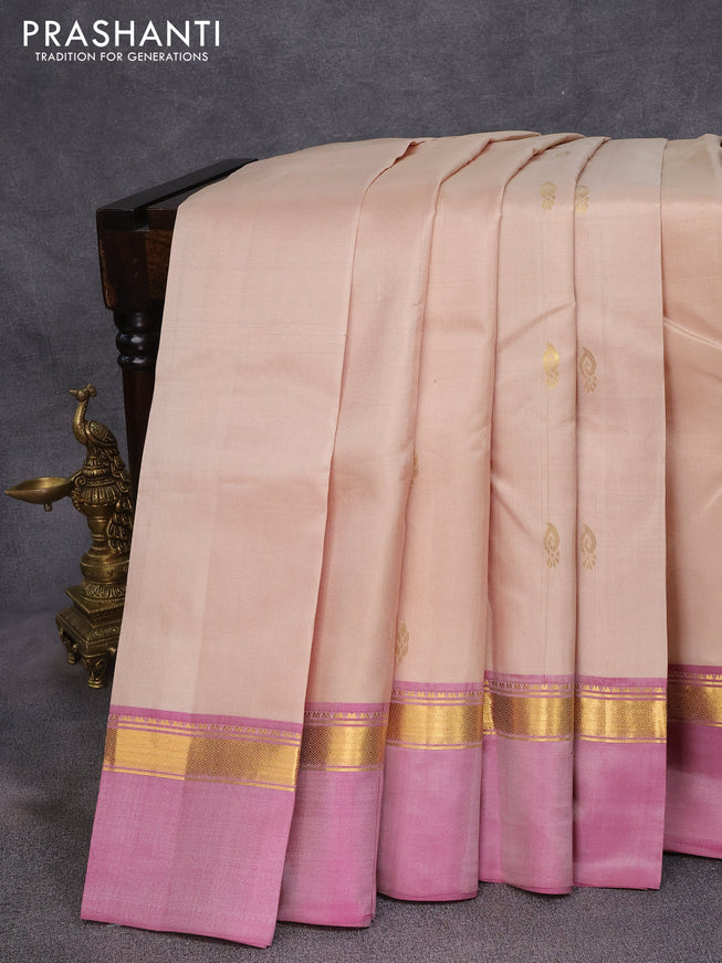 Pure kanjivaram silk saree beige and deep purple with zari woven buttas and zari woven simple border