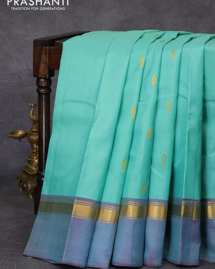 Pure kanjivaram silk saree pastel green and deep purple with zari woven buttas and zari woven simple border