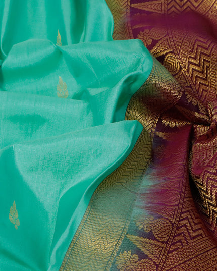 Pure kanjivaram silk saree pastel green and deep purple with zari woven buttas and zari woven simple border