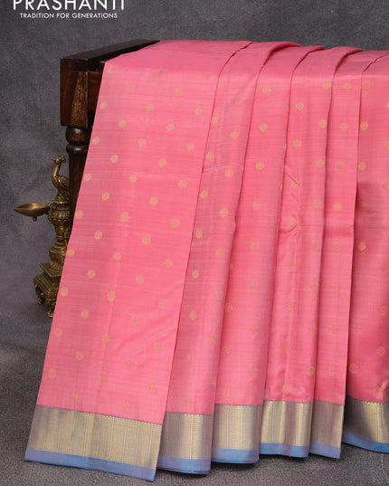 Pure kanjivaram silk saree pink shade and dual shade of cs blue with zari woven buttas and zari woven border