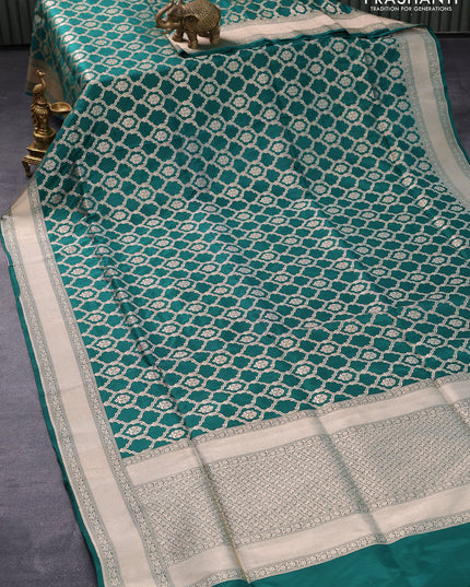 Pure banarasi uppada silk saree dark green with allover geometric zari weaves and zari woven border