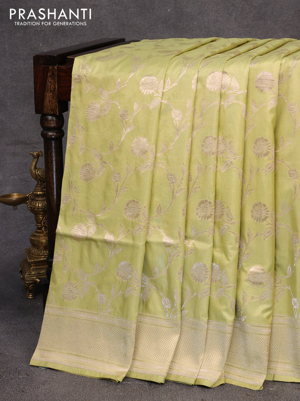 Pure banarasi uppada silk saree pista green with allover zari woven floral weaves and zari woven border