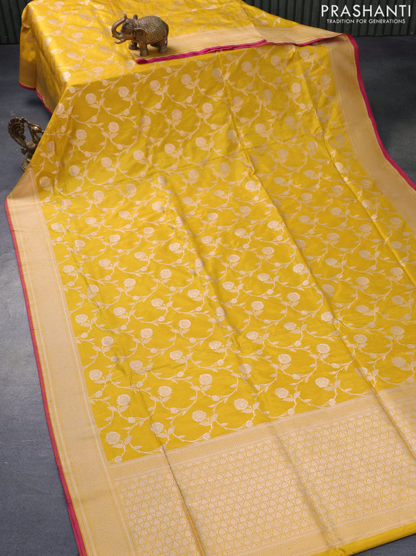 Pure banarasi uppada silk saree mustard yellow and pink with allover zari woven floral weaves and zari woven border