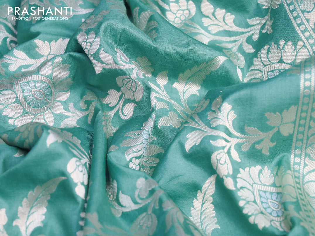 Pure banarasi uppada silk saree pastel blue with allover zari woven floral weaves and zari woven border