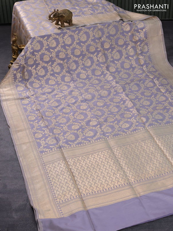 Pure banarasi uppada silk saree pastel grey with allover zari woven floral weaves and zari woven border
