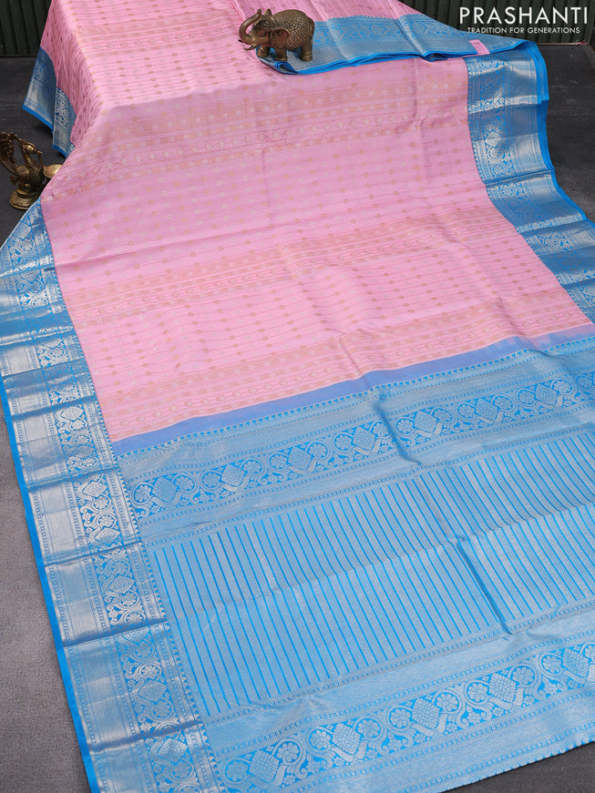 Pure kanjivaram silk saree light pink and cs blue with silver & gold zari woven floral butta weaves and silver zari woven border