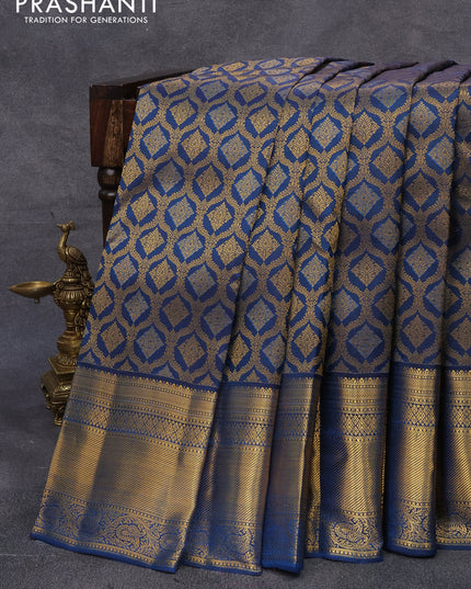 Pure kanjivaram silk saree peacock blue with allover zari woven brocade weaves and zari woven border