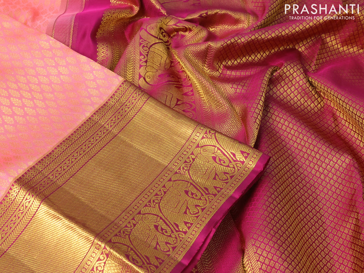 Pure kanjivaram silk saree peach pink and pink with allover zari woven butta weaves and zari woven elephant border