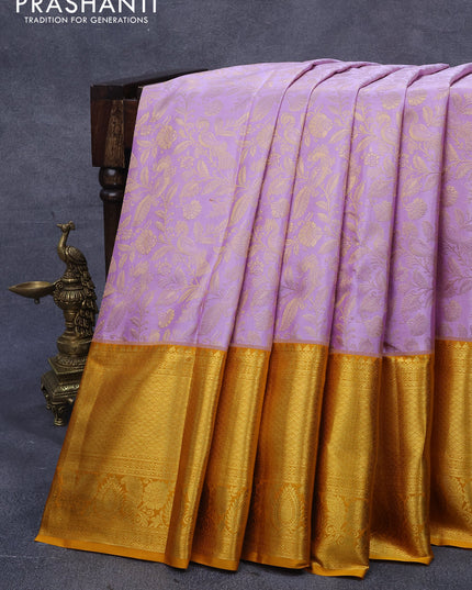 Pure kanjivaram silk saree lavender shade and mustard yellow with allover zari woven floral weaves and long zari woven border