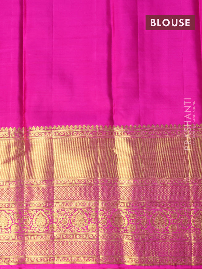 Pure kanjivaram silk saree teal blue shade and magenta pink with allover zari checks & buttas and long zari woven border