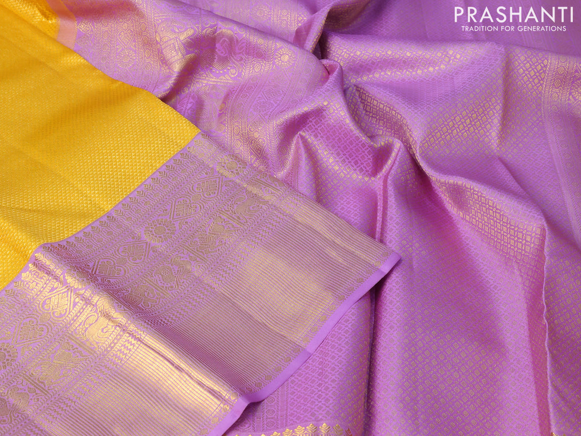 Pure kanjivaram silk saree mustard yellow and lavender shade with allover zari woven brocade weaves and long zari woven border