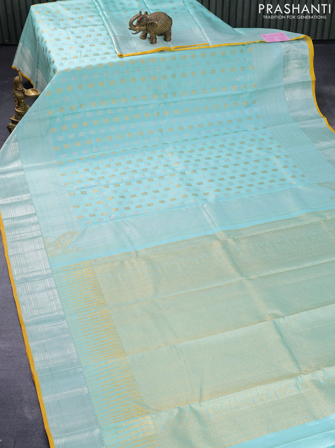 Pure kanjivaram silk saree teal blue shade and yellow with silver & gold zari woven annam buttas and long silver zari woven border