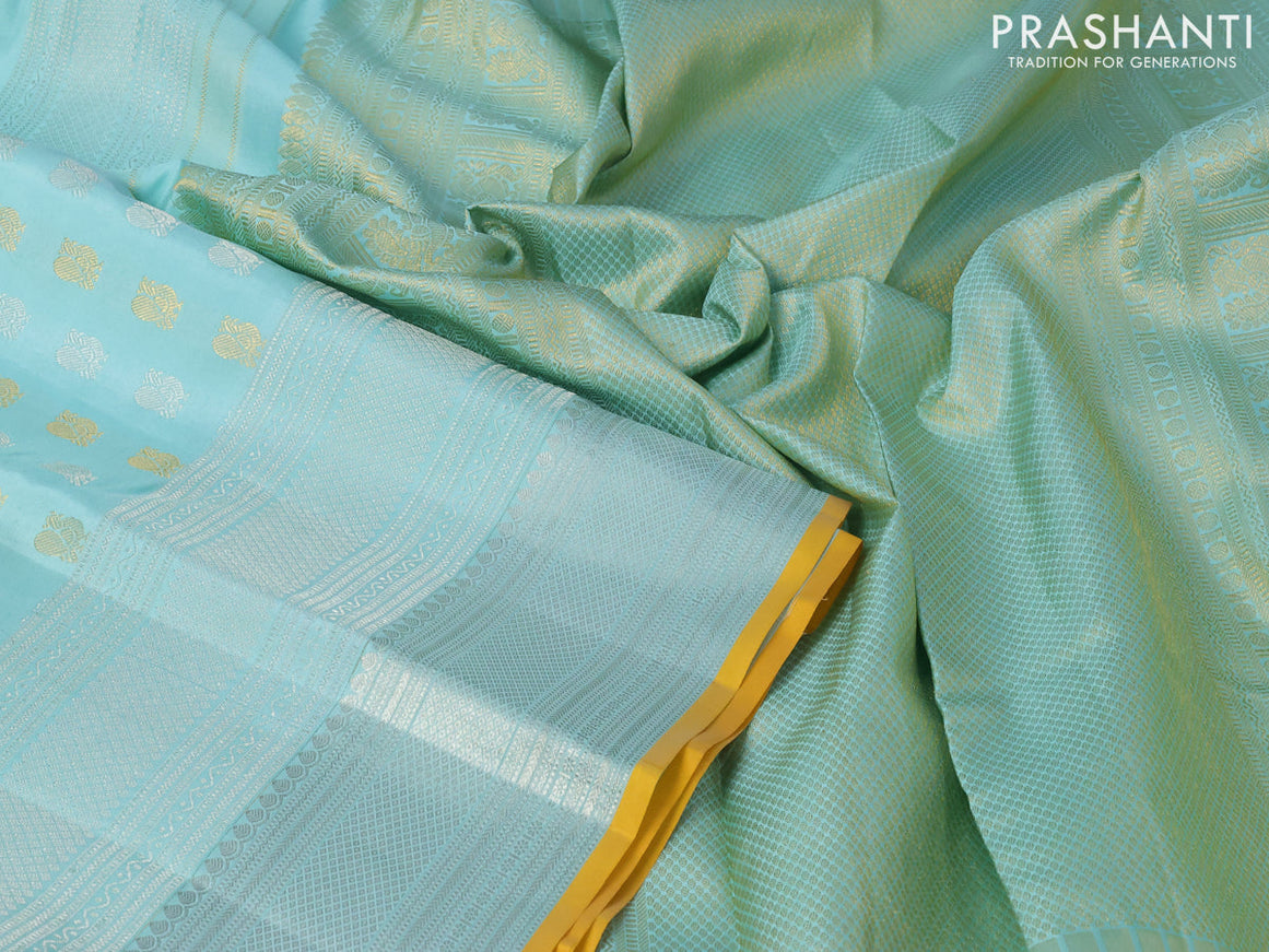Pure kanjivaram silk saree teal blue shade and yellow with silver & gold zari woven annam buttas and long silver zari woven border