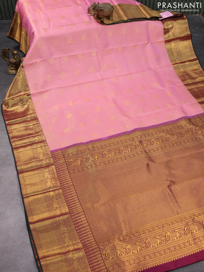 Pure kanjivaram silk saree light pink and dual shade of maroon with allover zari woven brocade weaves and elephant design zari woven border