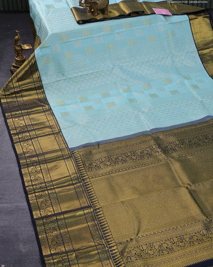 Pure kanjivaram silk saree light blue and dark navy blue with allover silver & gold zari woven geometric weaves and long zari woven border