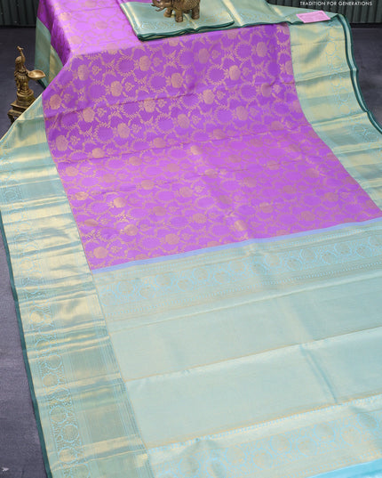 Pure kanjivaram silk saree lavender shade and light blue with allover zari woven floral brocade weaves and long zari woven floral border