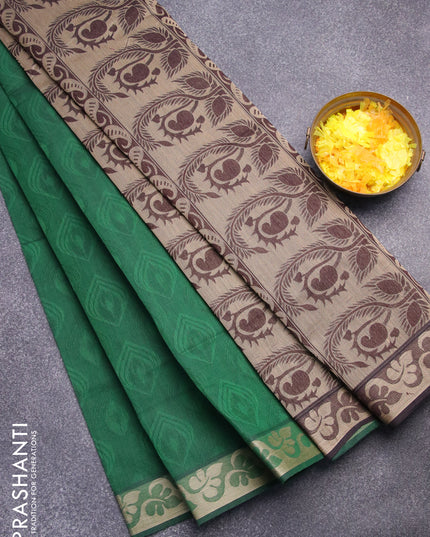 Coimbatore cotton saree green and coffee brown with allover self emboss and thread woven border