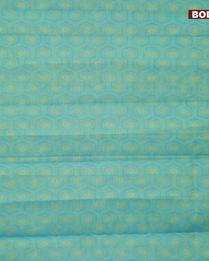 Coimbatore cotton saree dual shade of teal bluish green and pink with allover self emboss and thread woven border