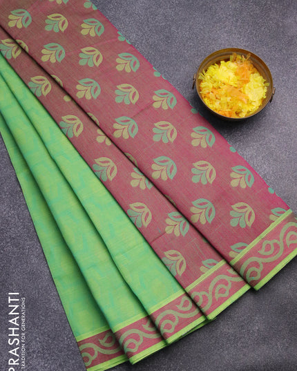 Coimbatore cotton saree light green and pink with allover self emboss and thread woven border