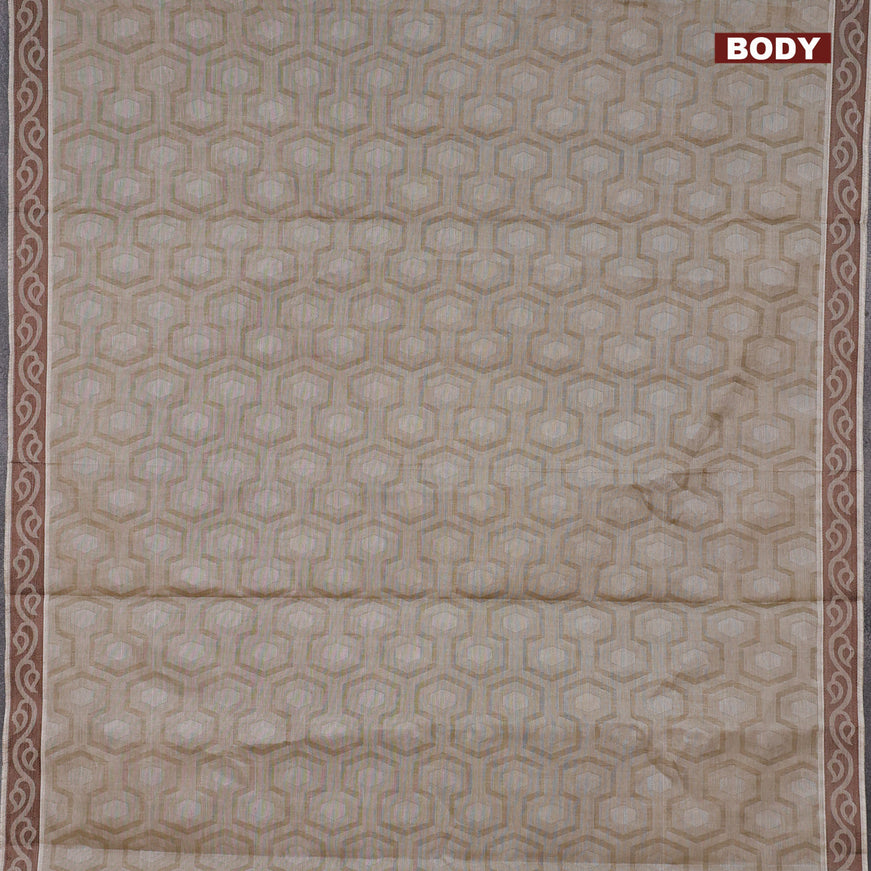Coimbatore cotton saree grey shade and brown with allover self emboss and thread woven border