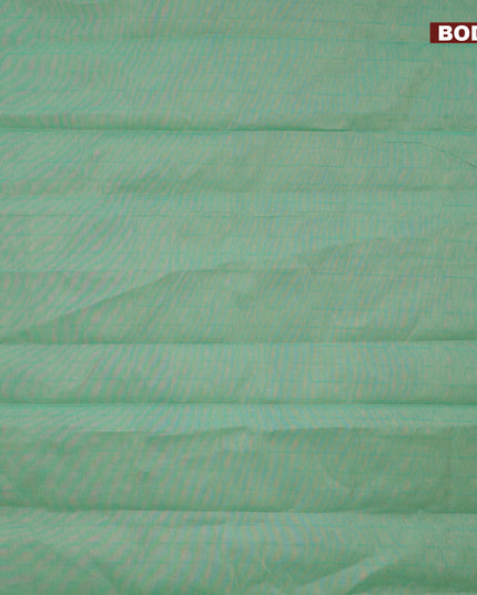 Coimbatore cotton saree pastel green and black with allover self emboss and thread woven border