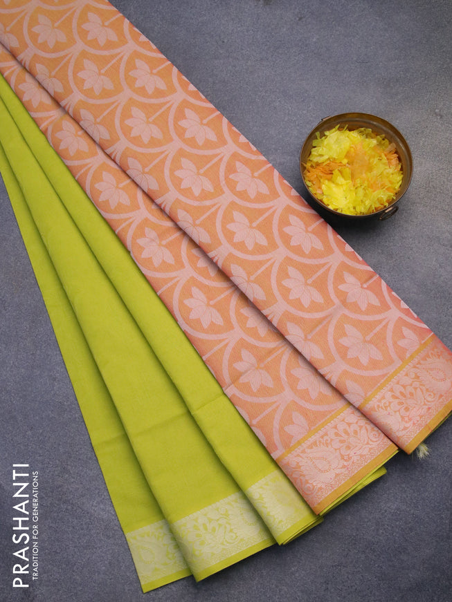 Coimbatore cotton saree fluorescent green and peach orange with allover self emboss and thread woven border