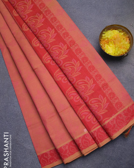 Coimbatore cotton saree dual shade of peach pink and red with allover self emboss and thread woven border