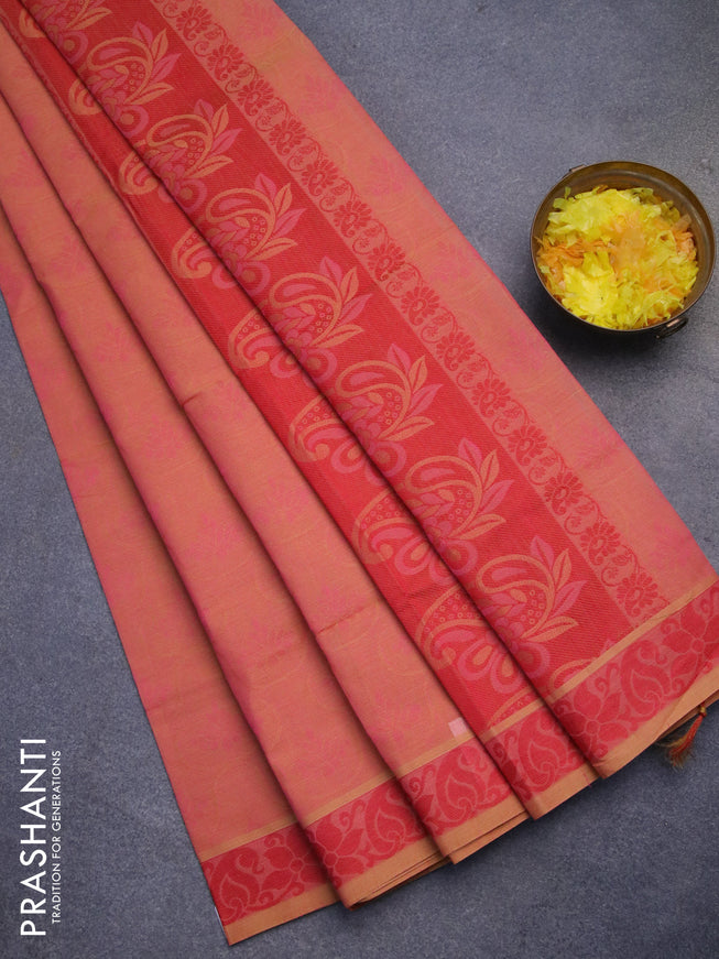 Coimbatore cotton saree dual shade of peach pink and red with allover self emboss and thread woven border