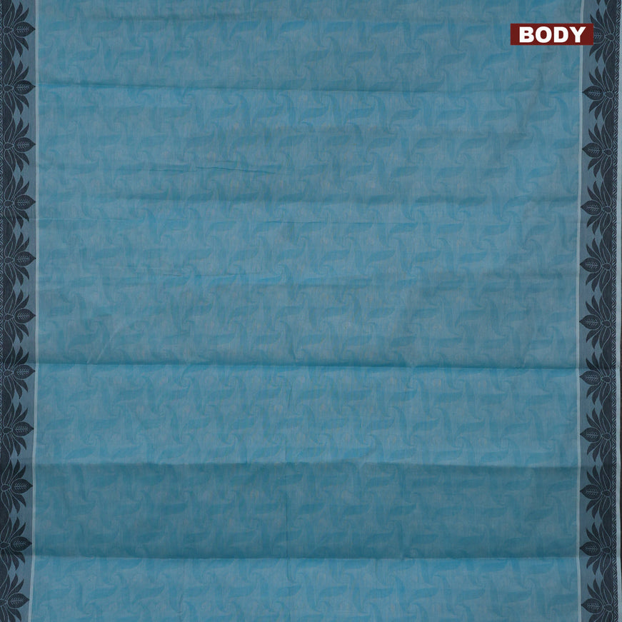 Coimbatore cotton saree light blue and black with allover self emboss and thread woven border