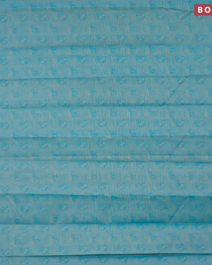 Coimbatore cotton saree teal blue shade and brown with allover self emboss and thread woven border